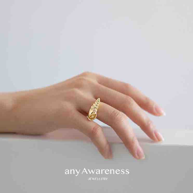 "Seafarer's Diary" series of open-ended zircon-set rings